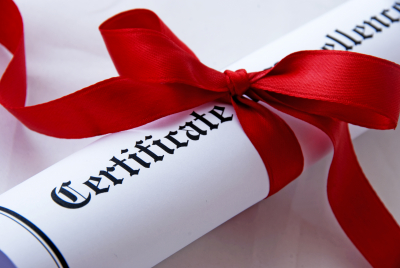 certificate of excellence with a red ribbon
